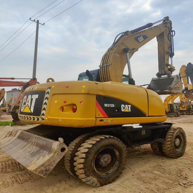Escavatore di seconda mano originale Cat M315D Usato Escavatore a ruote da 15 tonnellate con secchio da 0,61m3