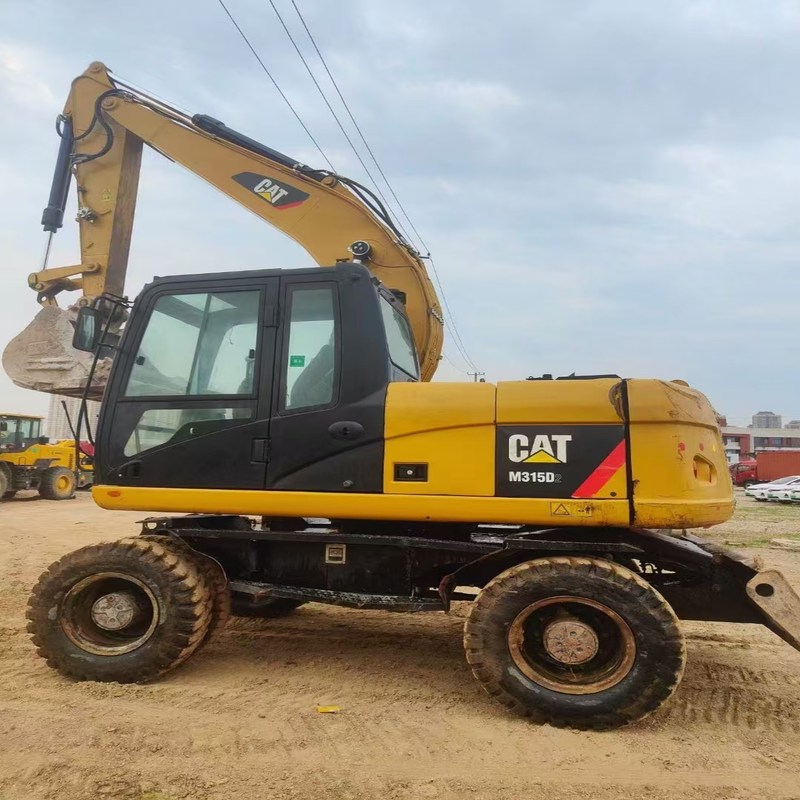 Escavatore di seconda mano originale Cat M315D Usato Escavatore a ruote da 15 tonnellate con secchio da 0,61m3